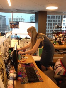 Eva installs Dilini's new cubicle