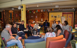 CASEL team working in a circle