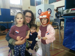 Alexandra Eidenberg and kids at voting booth