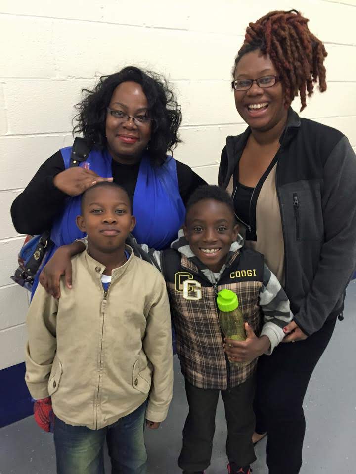Danielle and our Operations Manager Byanca pose with each of their sons.