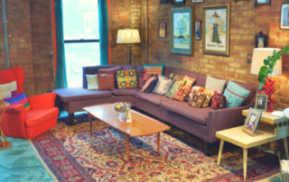 A spacious couch grouping with seating for fewer than 10 people.